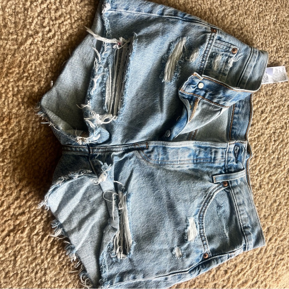 Levi’s Distressed Light Blue Denim Shorts